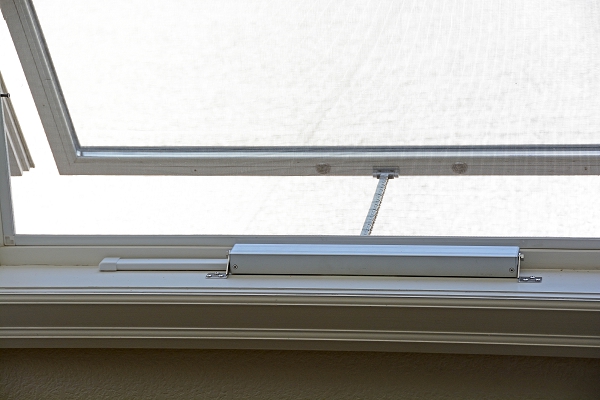 motorized-window-openers-chain-actuator-closeup-from-room